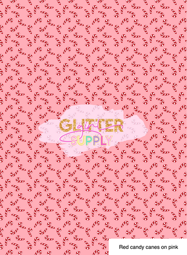 Red candy canes on pink