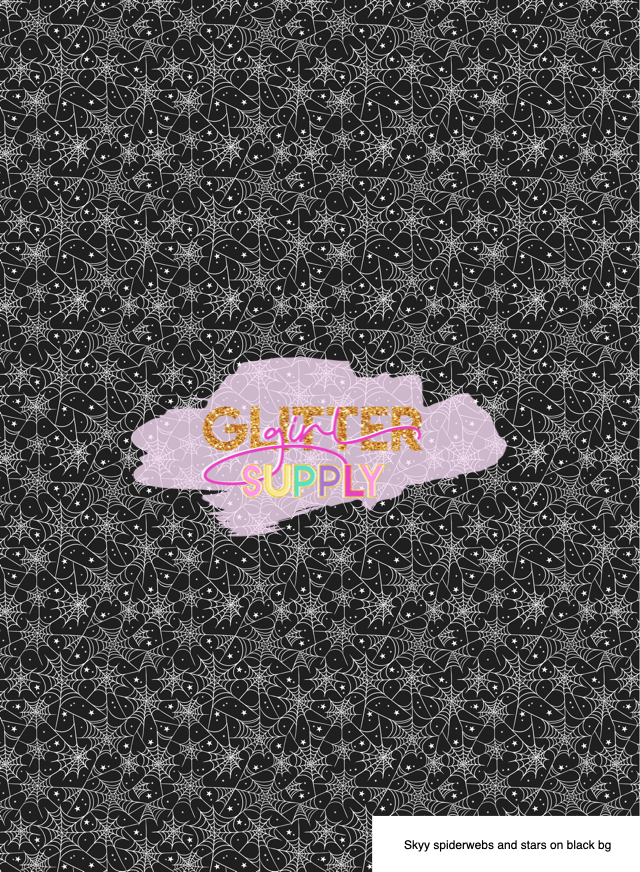 Skyy spiderwebs and stars on black bg